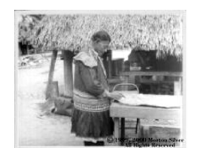AA Medicineman signing buckskin declaration web.JPG (40512 bytes)